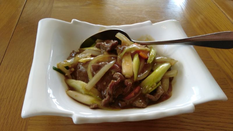 Beef with ginger and spring onions